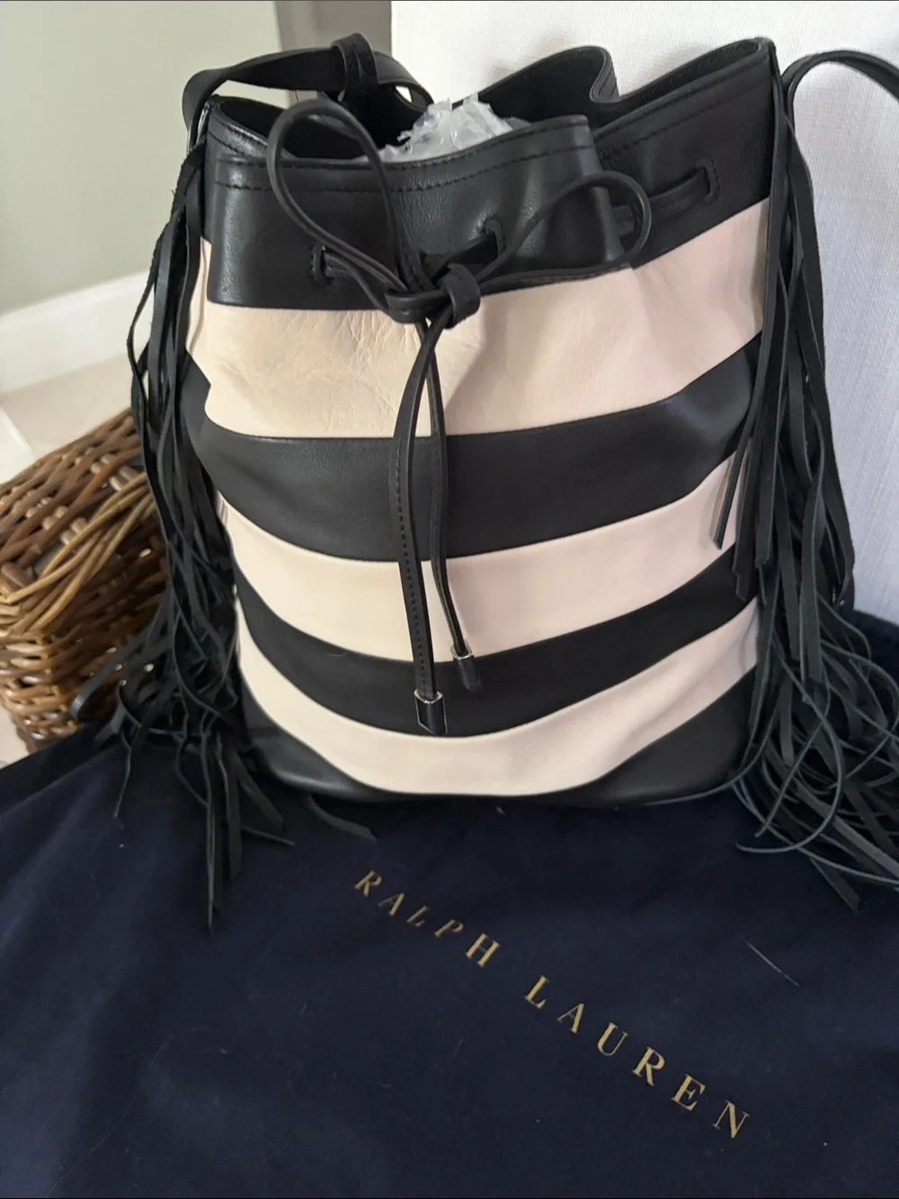 Ralph Lauren Black and cream leather bucket bag with wristlet